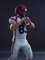 Image showing american football player throwing ball