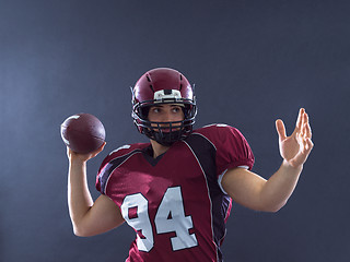 Image showing american football player throwing ball