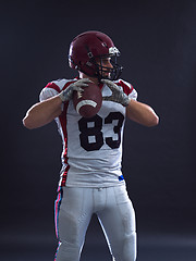 Image showing american football player throwing ball