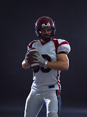 Image showing american football player throwing ball