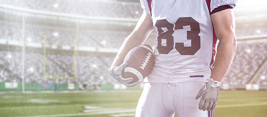 Image showing closeup American Football Player isolated on big modern stadium