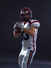 Image showing american football player throwing ball