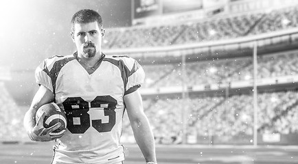 Image showing American Football Player isolated on big modern stadium field