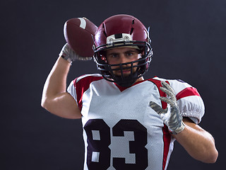 Image showing american football player throwing ball