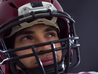 Image showing closeup American Football Player isolated on gray