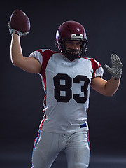 Image showing american football player throwing ball