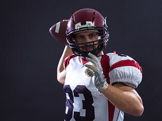 Image showing american football player throwing ball