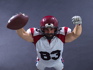 Image showing american football player celebrating touchdown