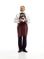 Image showing Senior waiter at studio