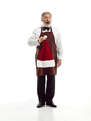 Image showing Senior waiter at studio