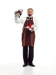 Image showing Senior waiter at studio