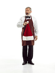 Image showing Senior waiter at studio