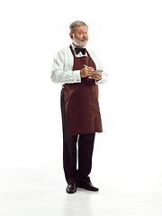 Image showing Senior waiter at studio