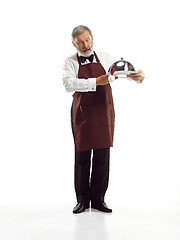 Image showing Senior waiter at studio