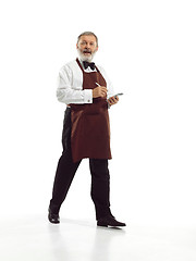 Image showing Senior waiter at studio