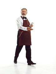 Image showing Senior waiter at studio