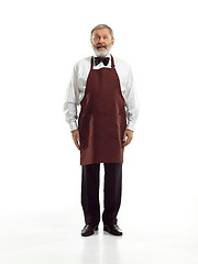 Image showing Senior waiter at studio