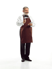 Image showing Senior waiter at studio