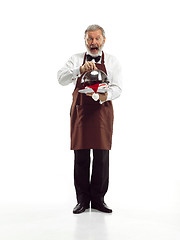 Image showing Senior waiter at studio