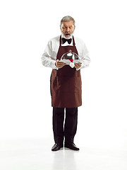 Image showing Senior waiter at studio
