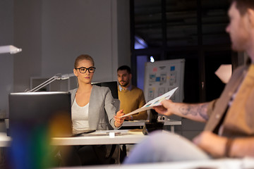 Image showing designers or software developers at night office