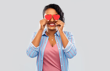 Image showing happy african american woman with eyes of hearts