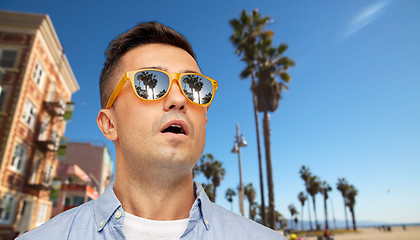 Image showing surprised man in sunglasses over venice beach