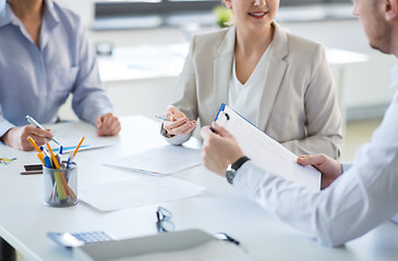 Image showing business team discussing report at office