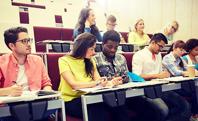 Image showing group of students with smartphone at lecture