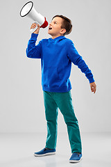 Image showing smiling boy speaking to megaphone