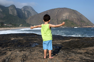 Image showing Kid contemplating nature in Itacoatiara beach 