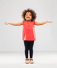 Image showing happy little african american girl with arms apart