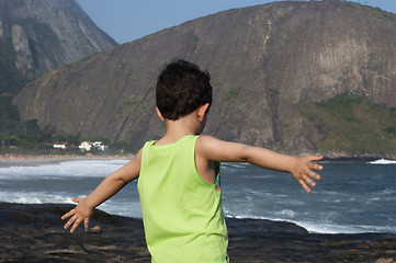 Image showing Kid contemplating nature in Itacoatiara beach 