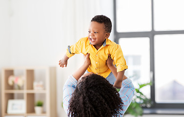 Image showing happy african american mother with baby at home