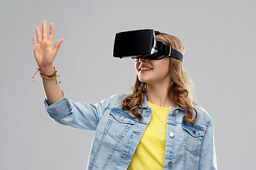 Image showing teen girl in virtual reality headset or vr glasses