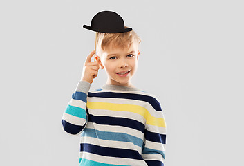 Image showing smiling boy with black vintage bowler hat