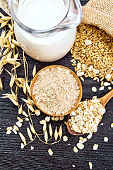 Image showing Flour oat in bowl with grain on board top