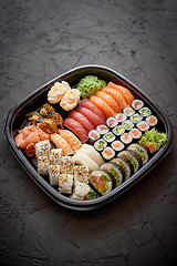 Image showing Various kinds of sushi on plate or platter set