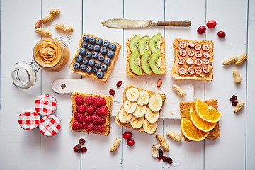 Image showing Assortment of healthy fresh breakfast toasts