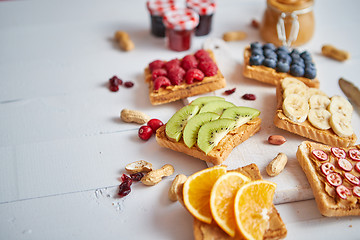 Image showing Assortment of healthy fresh breakfast toasts