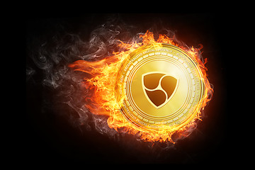 Image showing Golden NEM coin flying in fire flame.