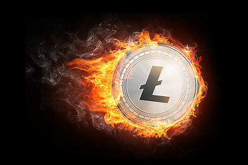 Image showing Golden Litecoin coin flying in fire flame.