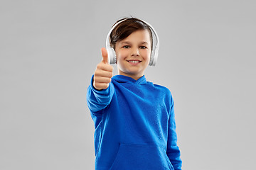 Image showing portrait of smiling boy in blue hoodie