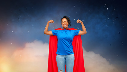 Image showing happy african american woman in superhero red cape