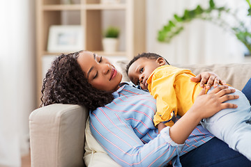 Image showing happy african american mother with baby at home