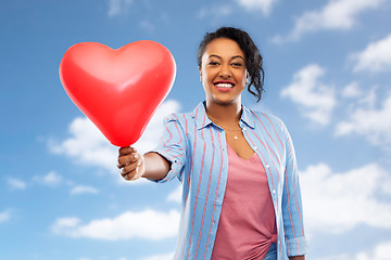 Image showing african american woman with heart-shaped balloon