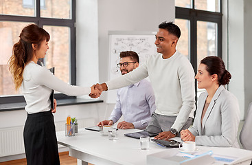 Image showing recruiters having job interview with employee