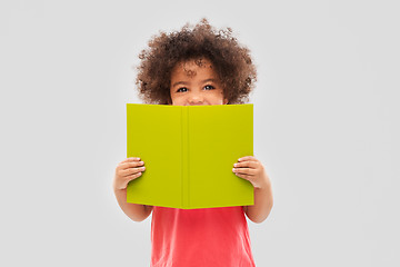 Image showing happy little african american girl with book