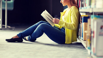 Image showing high school student girl reading book at library