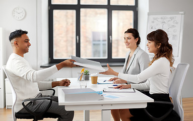 Image showing recruiters having job interview with male employee